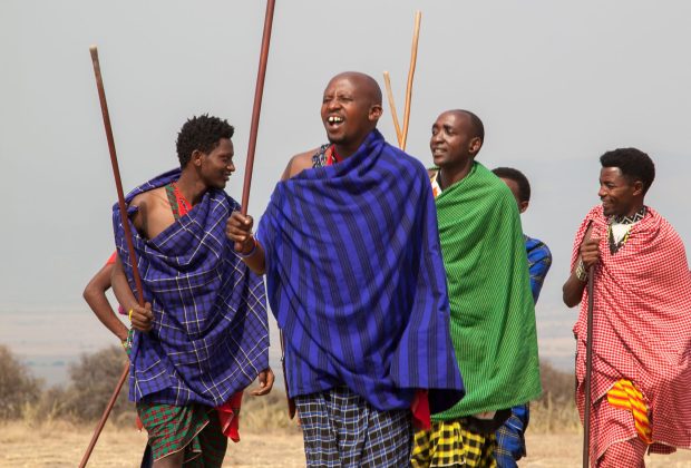 Maasai warriors in traditional dress during cultural visit