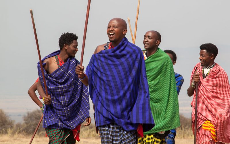 Maasai warriors in traditional dress during cultural visit